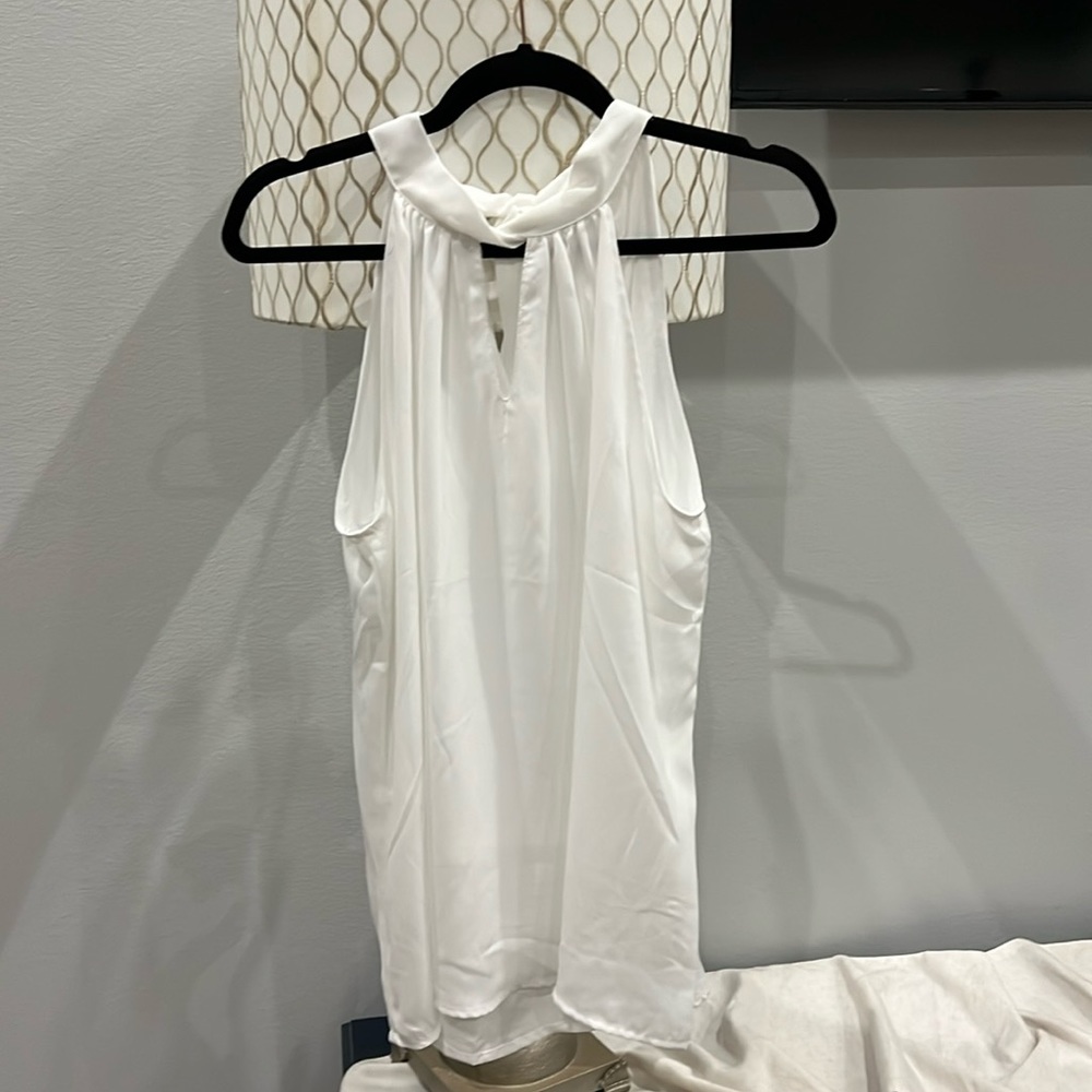 White sleeveless blouse